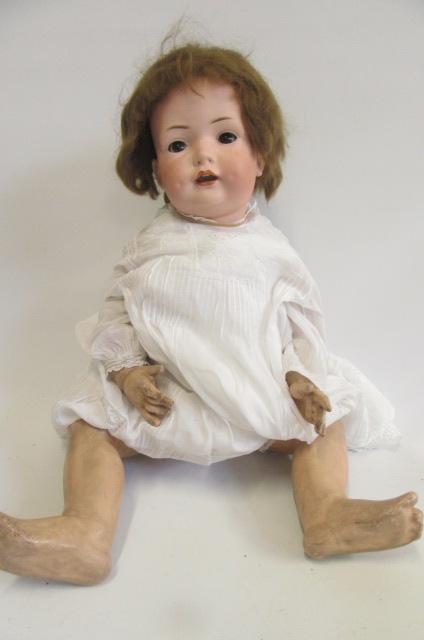 A Bahr & Proschild bisque head doll with brown glass sleeping eyes Image