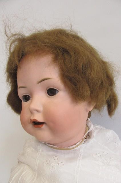 A Bahr & Proschild bisque head doll with brown glass sleeping eyes Image