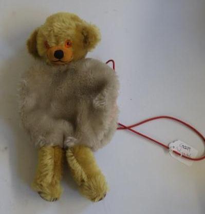 A Merrythought child's muff teddy bear with gold and beige plush Image