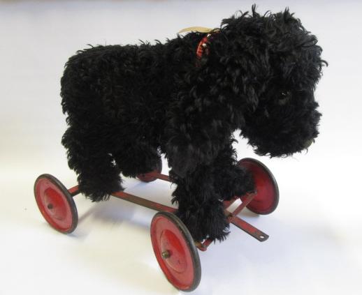A Farnell "Alphatoy" dog on wheels Image