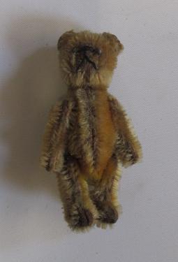 A Schuco miniature teddy bear Image