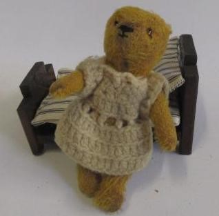 A mid 20th century soldier bear with black/amber eyes Image