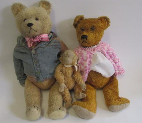 Two mid to late 20th century teddy bears in gold plush with black/amber eyes Image