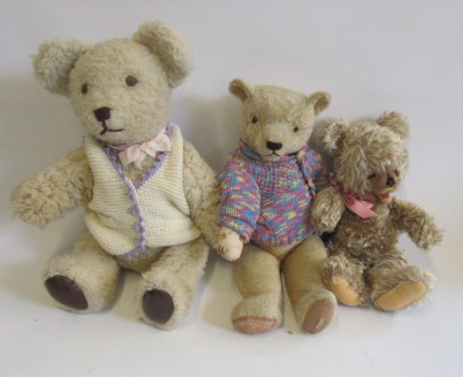 An early to mid 20th century Chiltern English teddy bear with black/amber eyes and swivel joints Image
