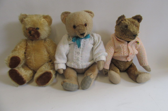 A mid 1930's Schuco bear in gold plush with darker nose and pads Image