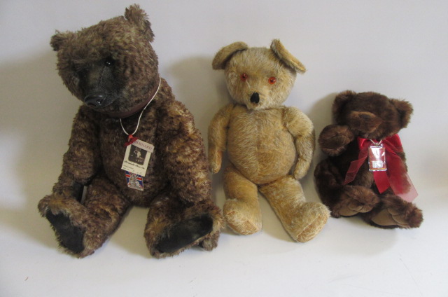 A 1930's Chiltern teddy bear in pale gold plush with black/orange eyes Image