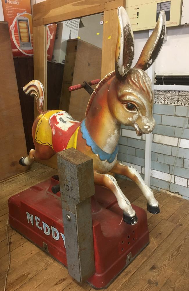 A Mechanical donkey "Neddy" electrically operated by coin in the slot with painted metal body on Image