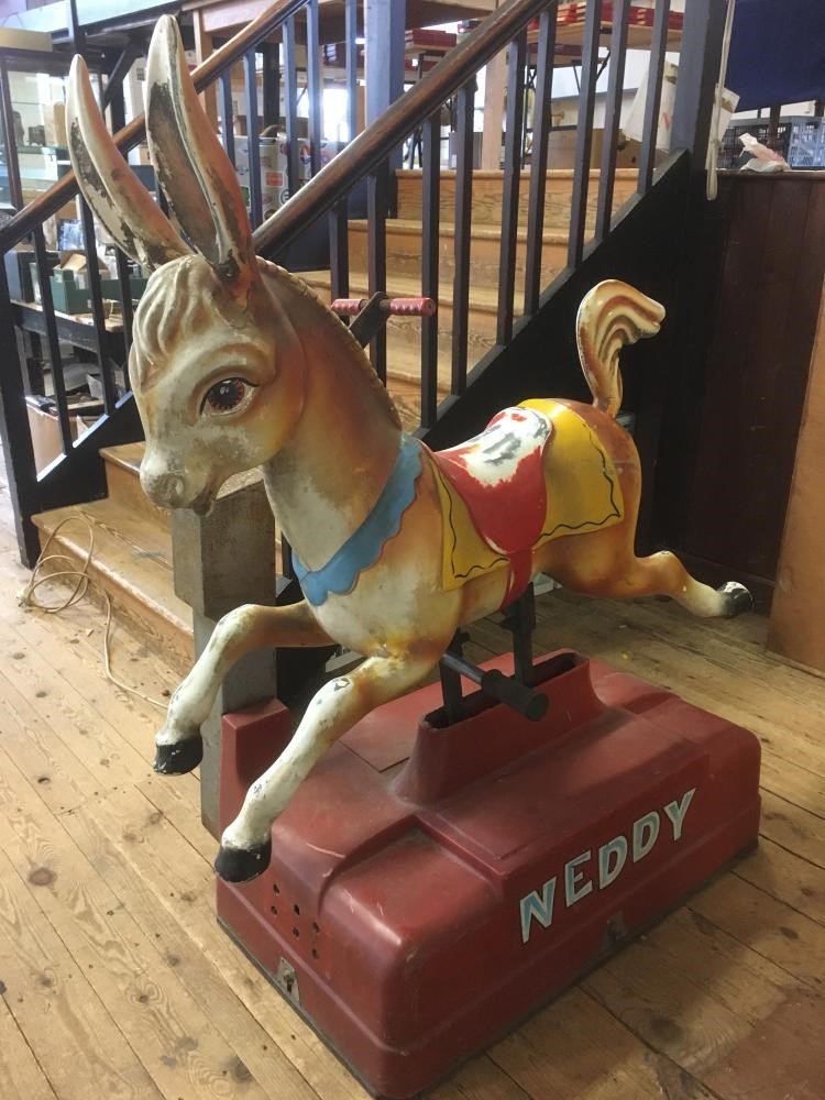 A Mechanical donkey "Neddy" electrically operated by coin in the slot with painted metal body on Image