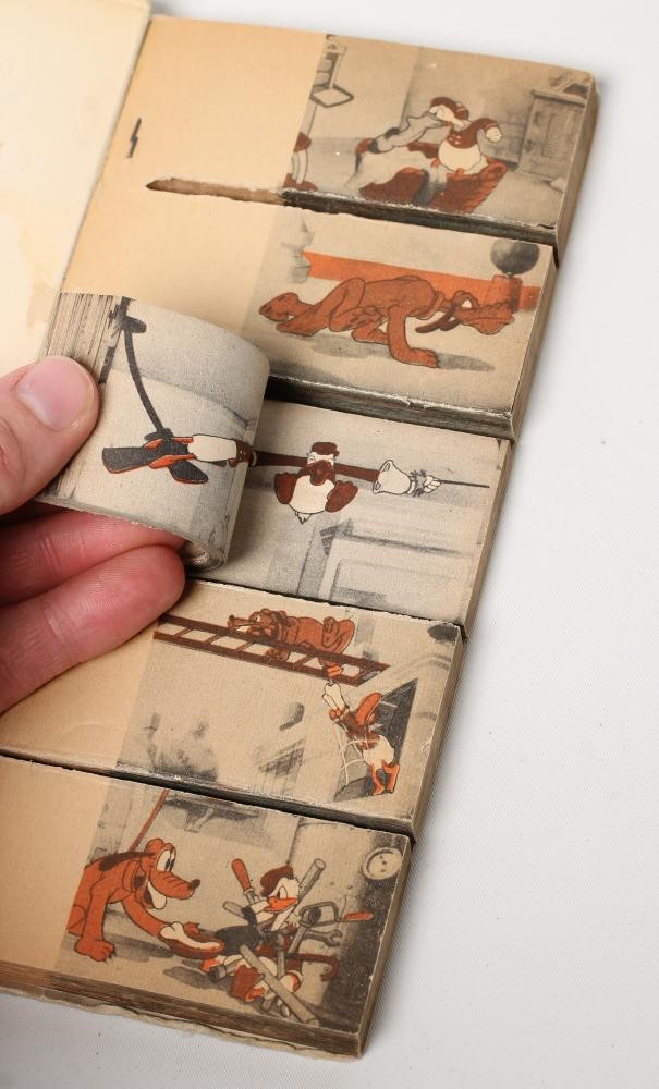 Donald and Pluto Movie Book in ten reels by Walt Disney Image