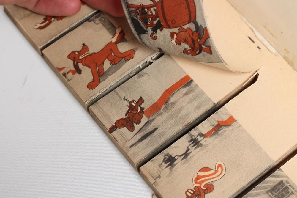 Donald and Pluto Movie Book in ten reels by Walt Disney Image