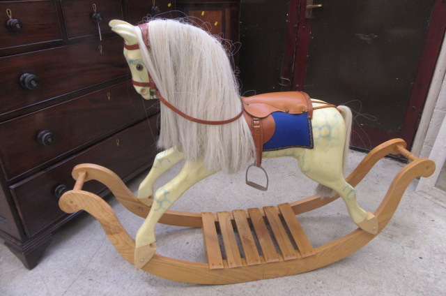 A painted wood rocking horse by Brian Stebbings Image