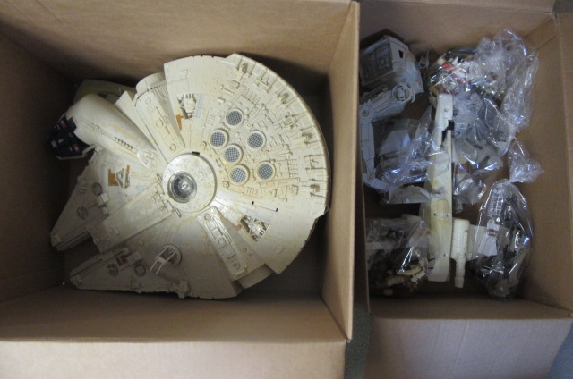 Various Star Wars items including Millenium Falcon and other vehicles Image
