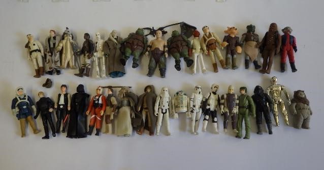 Various Star Wars items including Millenium Falcon and other vehicles Image