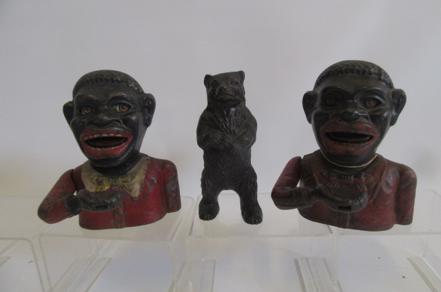Two cast iron "Jolly Nigger" money boxes Image
