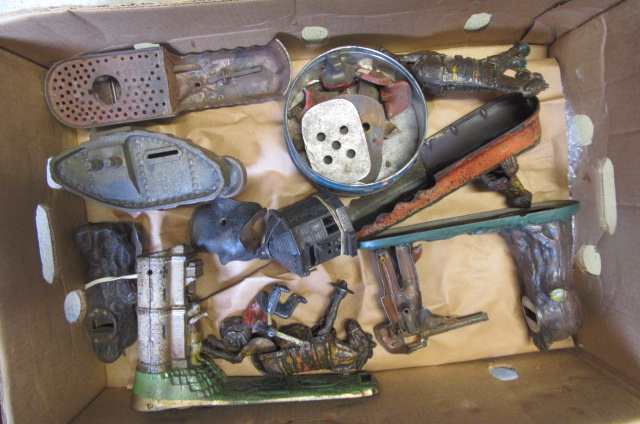 A quantity of incomplete cast iron novelty money boxes and spare parts including William Tell Image