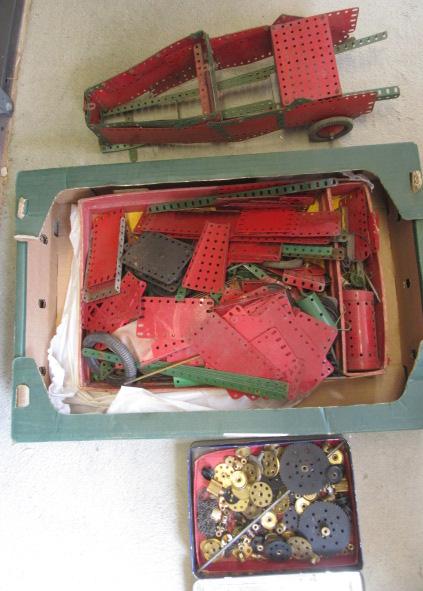 A quantity of Meccano parts including a clockwork motor Image