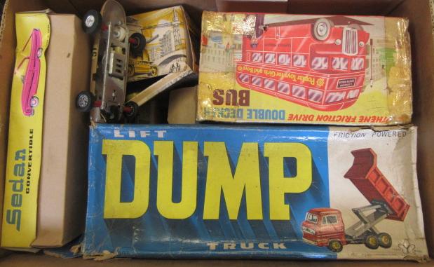 Nine boxed mainly friction drive tinplate and plastic toys and four unboxed (13) (Est. plus 21% Image
