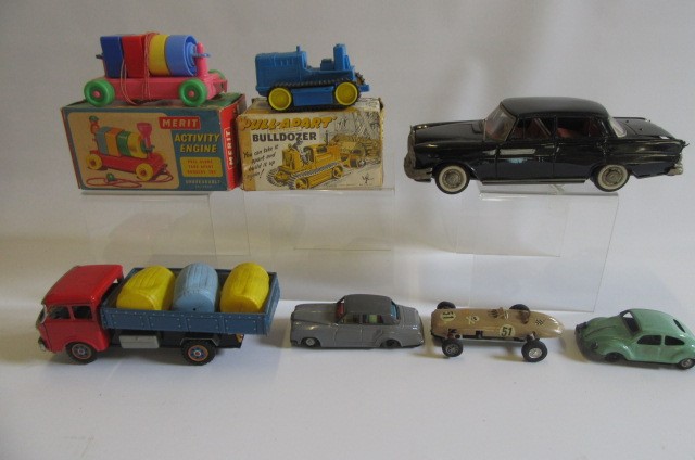 Nine boxed mainly friction drive tinplate and plastic toys and four unboxed (13) (Est. plus 21% Image
