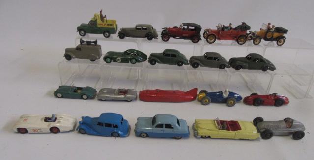 Fourteen Dinky car models Image