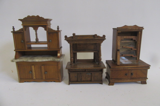 Three mid 20th century dolls' house wood dressers Image