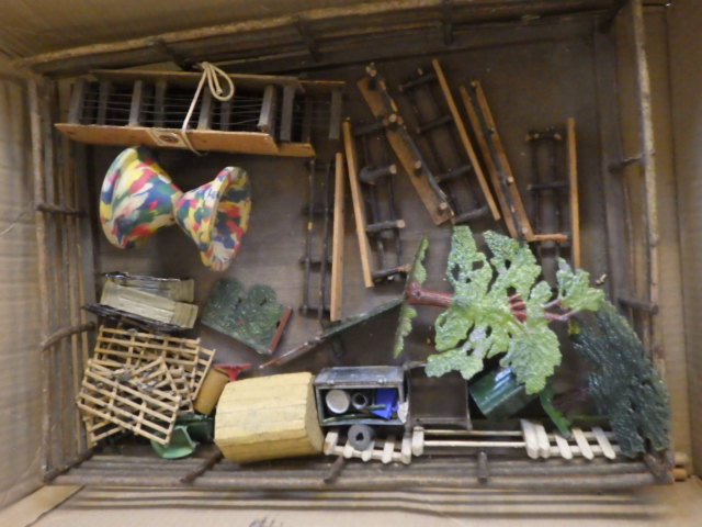 A quantity of Britains and other metal garden accessories and rustic wood fencing Image