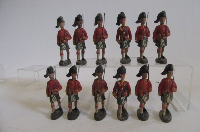 Twelve Elastolin composition figures of Highland Guardsmen marching (Est. plus 21% premium inc. VAT) Image