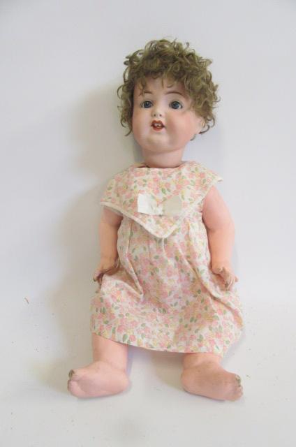 An Armand Marseille bisque head character doll with cry Image