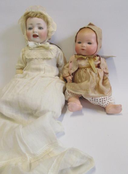 A Hertel Schwab & Co bisque head character doll with blue glass sleeping eyes Image