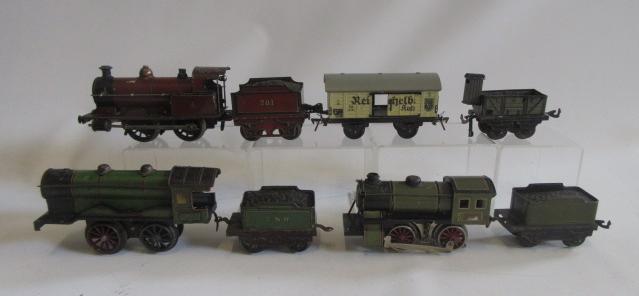 Playworn clockwork locomotives by Marklin including M.R. 0-4-0 tender locomotive Image