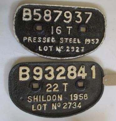 Two D-shaped truck plates Image