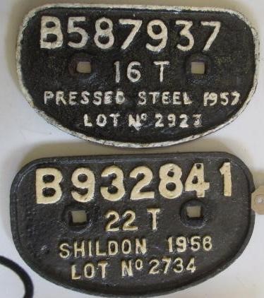 Two D-shaped truck plates Image