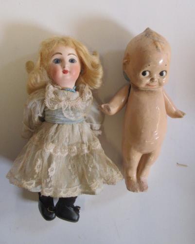A Danel et Cie Paris-Bebe bisque head doll with fixed blue glass eyes Image