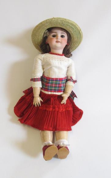 An S.F.B.J. French bisque head doll with brown glass sleeping eyes Image