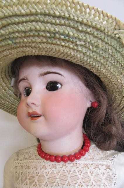 An S.F.B.J. French bisque head doll with brown glass sleeping eyes Image