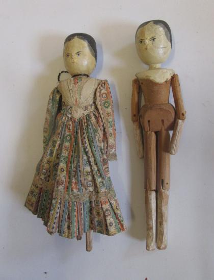 Two carved wood peg dolls Image