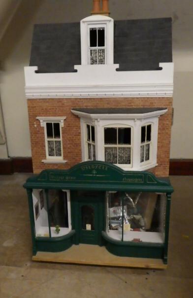 A doll's shop and house above Image