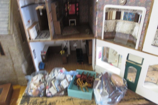 A doll's shop and house above Image