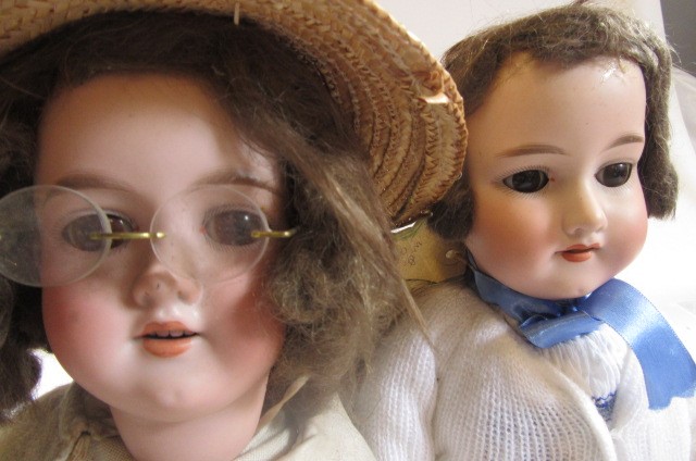 An Armand Marseille bisque head doll with brown glass eyes Image