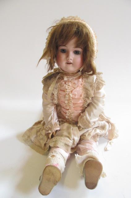 An A. Lanternier & Cie bisque head doll with fixed blue glass eyes Image