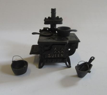 A doll's kitchen range Image