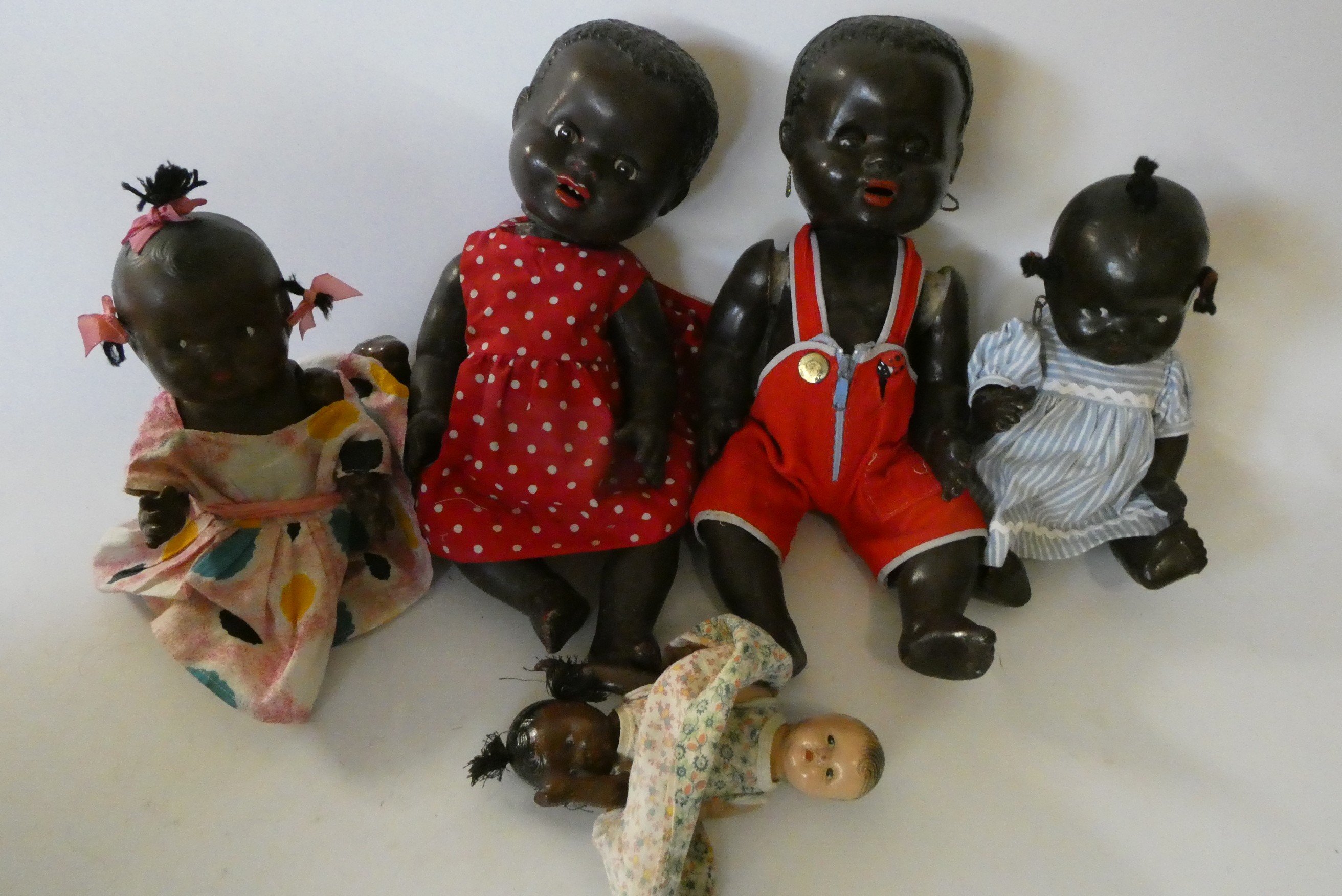 Five composition dolls Image