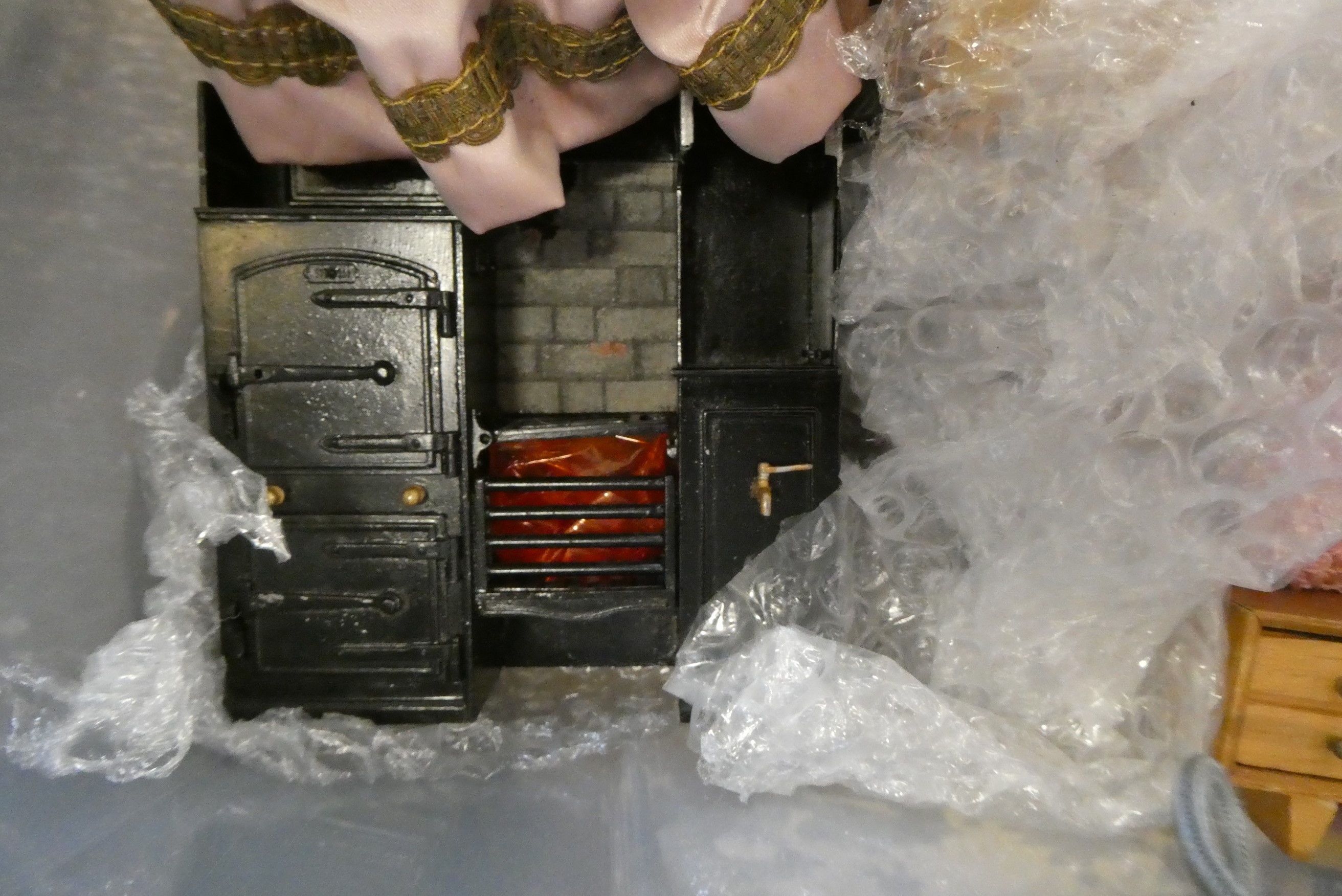 Four small boxes of doll's house furniture and accessories, including vintage wooden, metal and Image