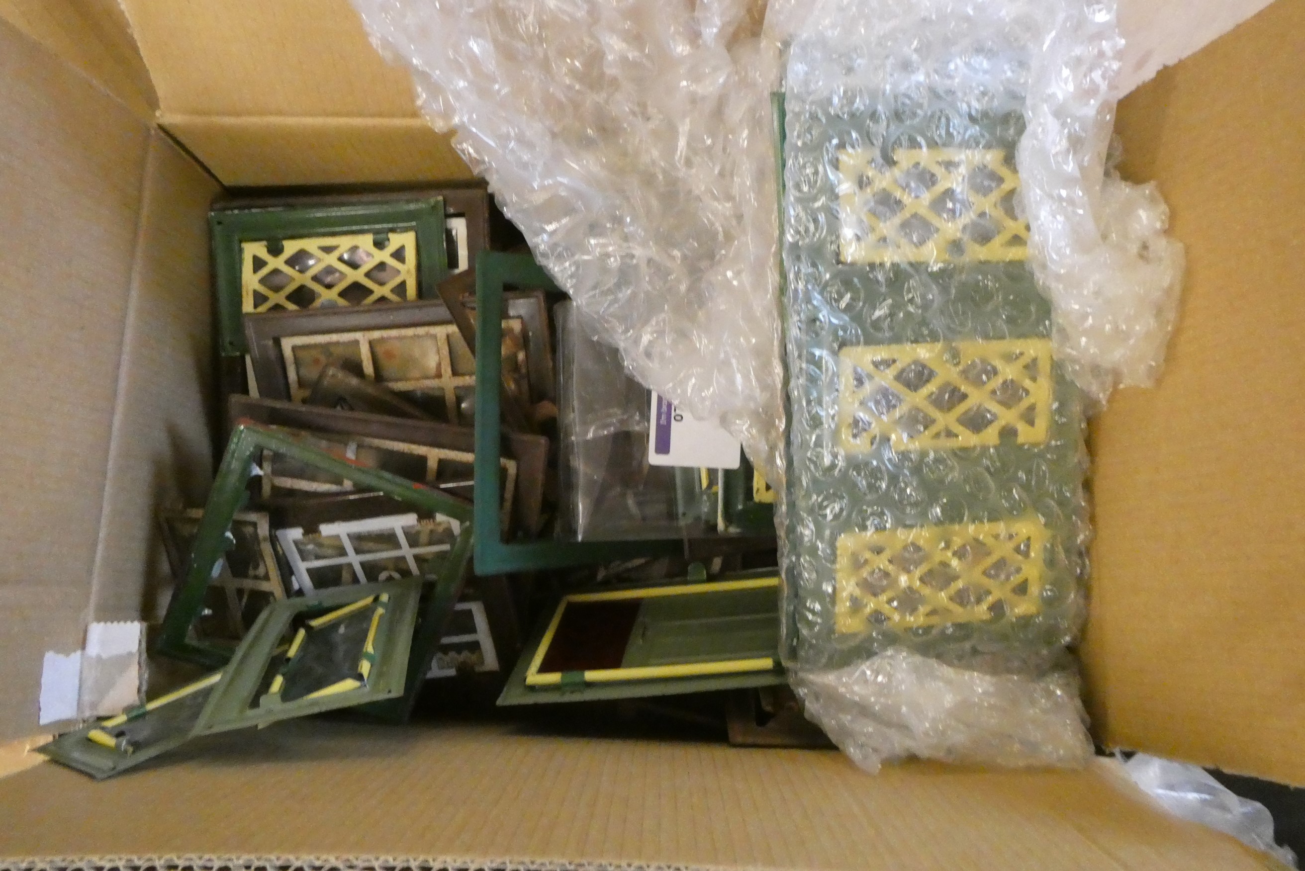 Three boxes of doll's house building items, including vintage metal windows and doors, modern wooden Image