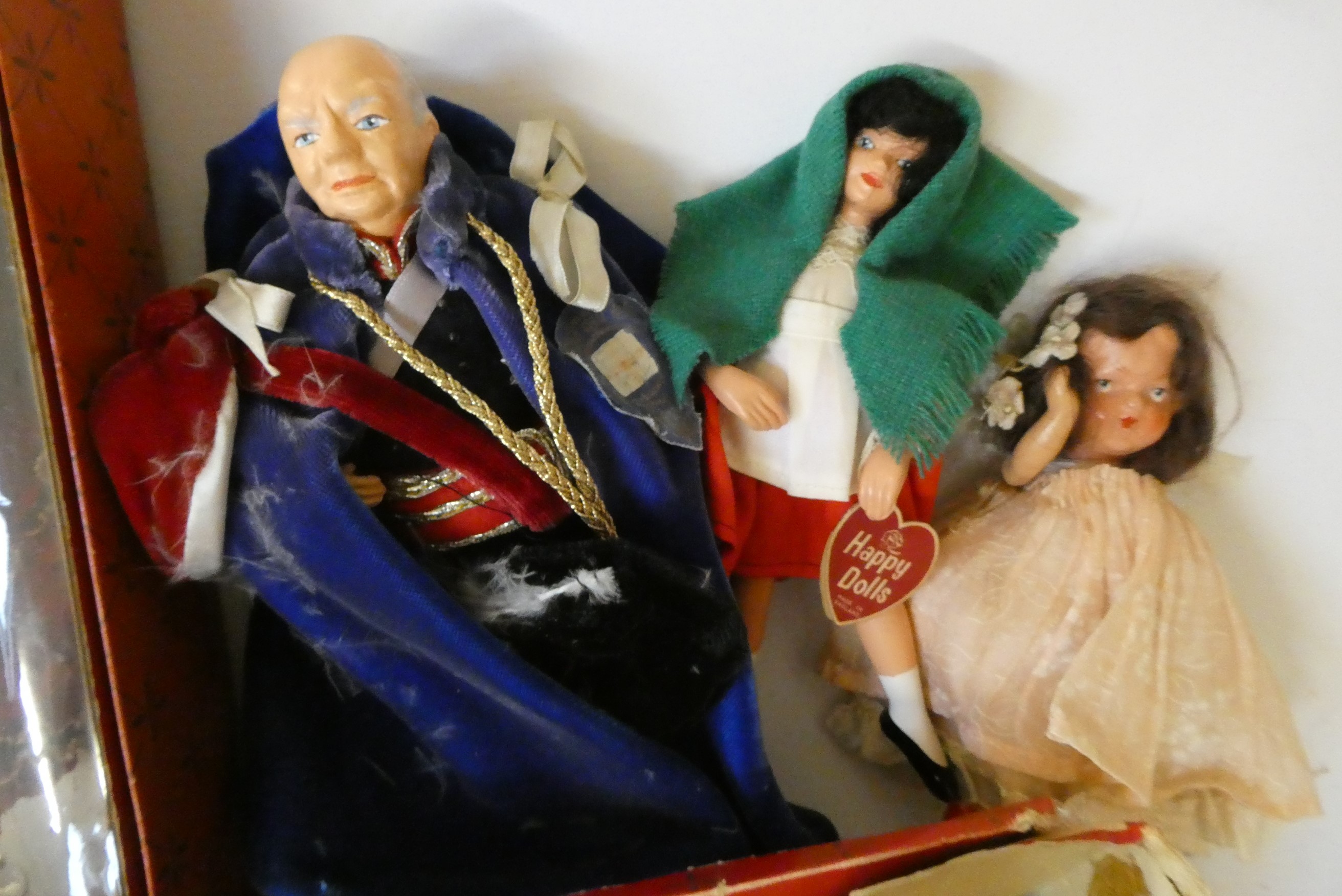 Nine Peggy Nisbet dolls comprising two Henry the VIII dolls, his six wives, and Churchill, together Image