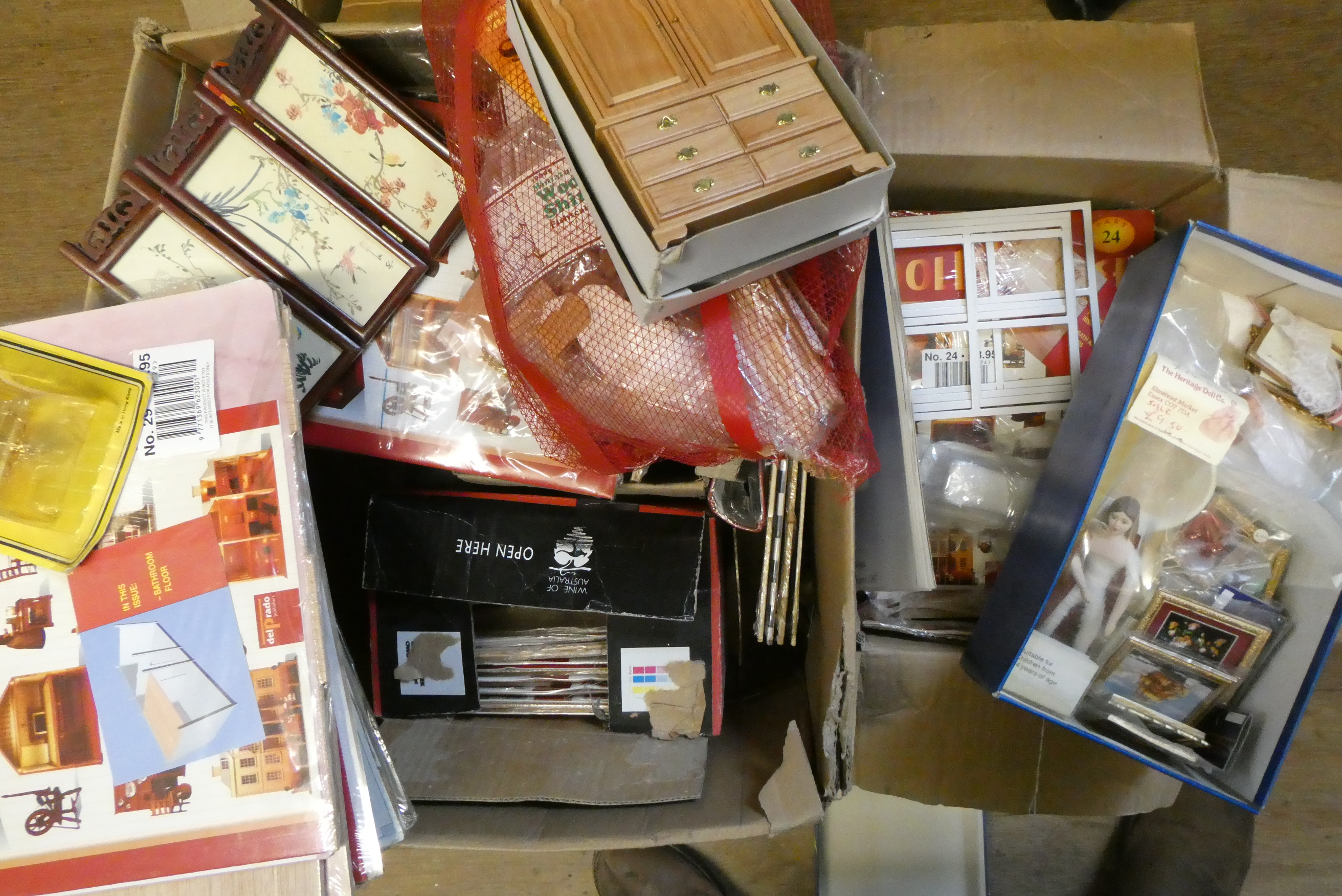 Two boxes of doll's house building sets, parts, dolls and accessories (Est. plus 24% premium inc. Image