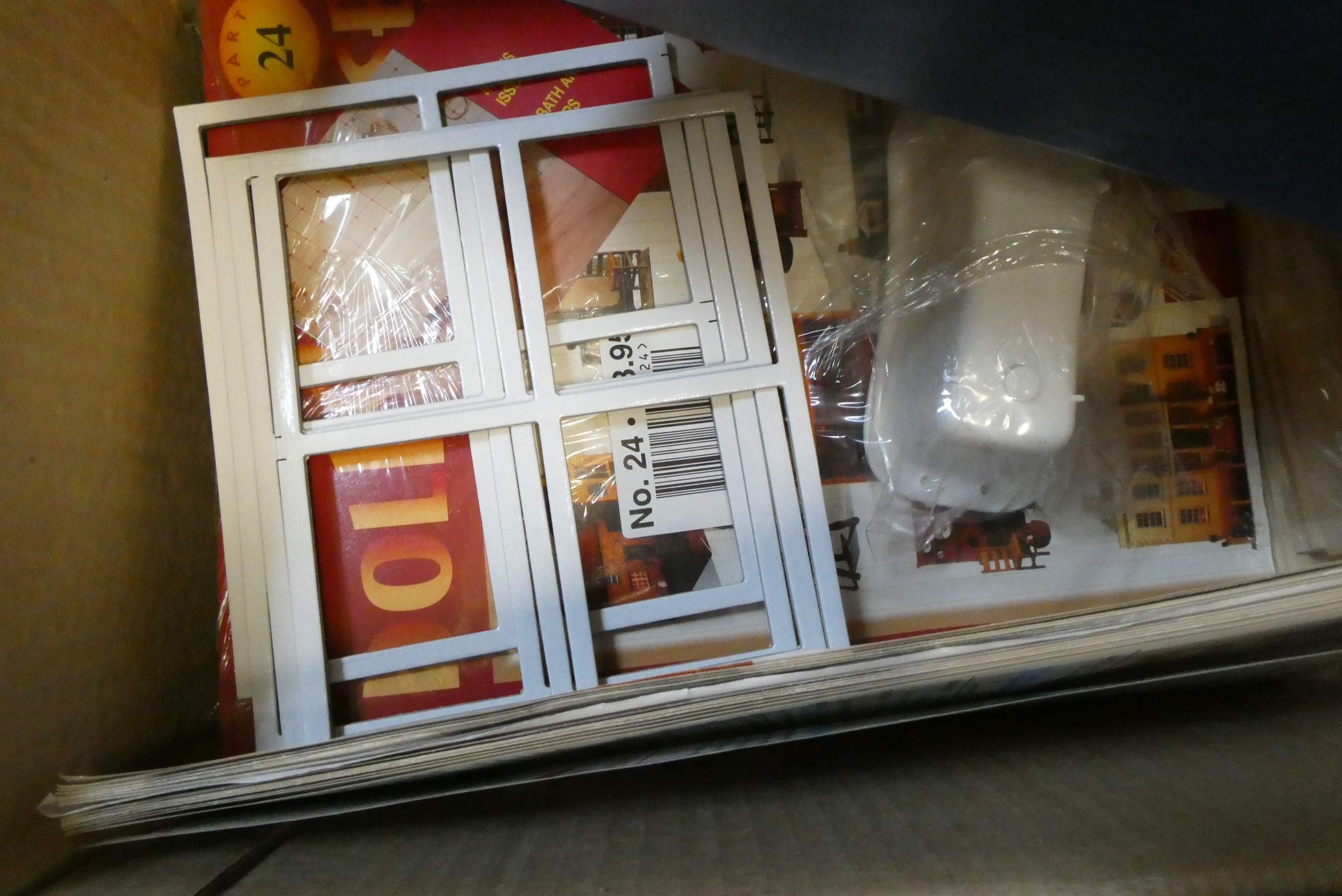 Two boxes of doll's house building sets, parts, dolls and accessories (Est. plus 24% premium inc. Image