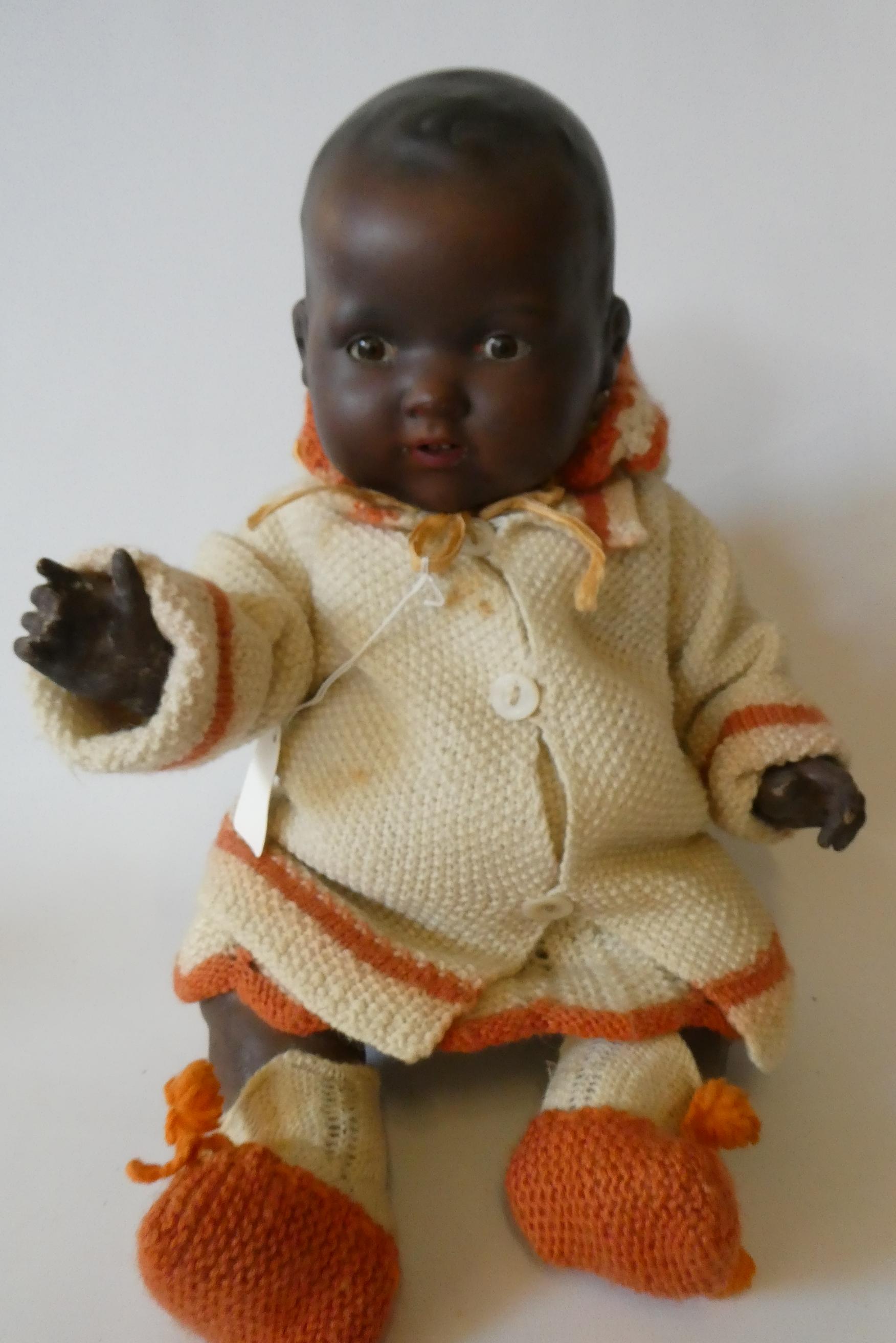 An Armand Marseille bisque socket head baby doll Image