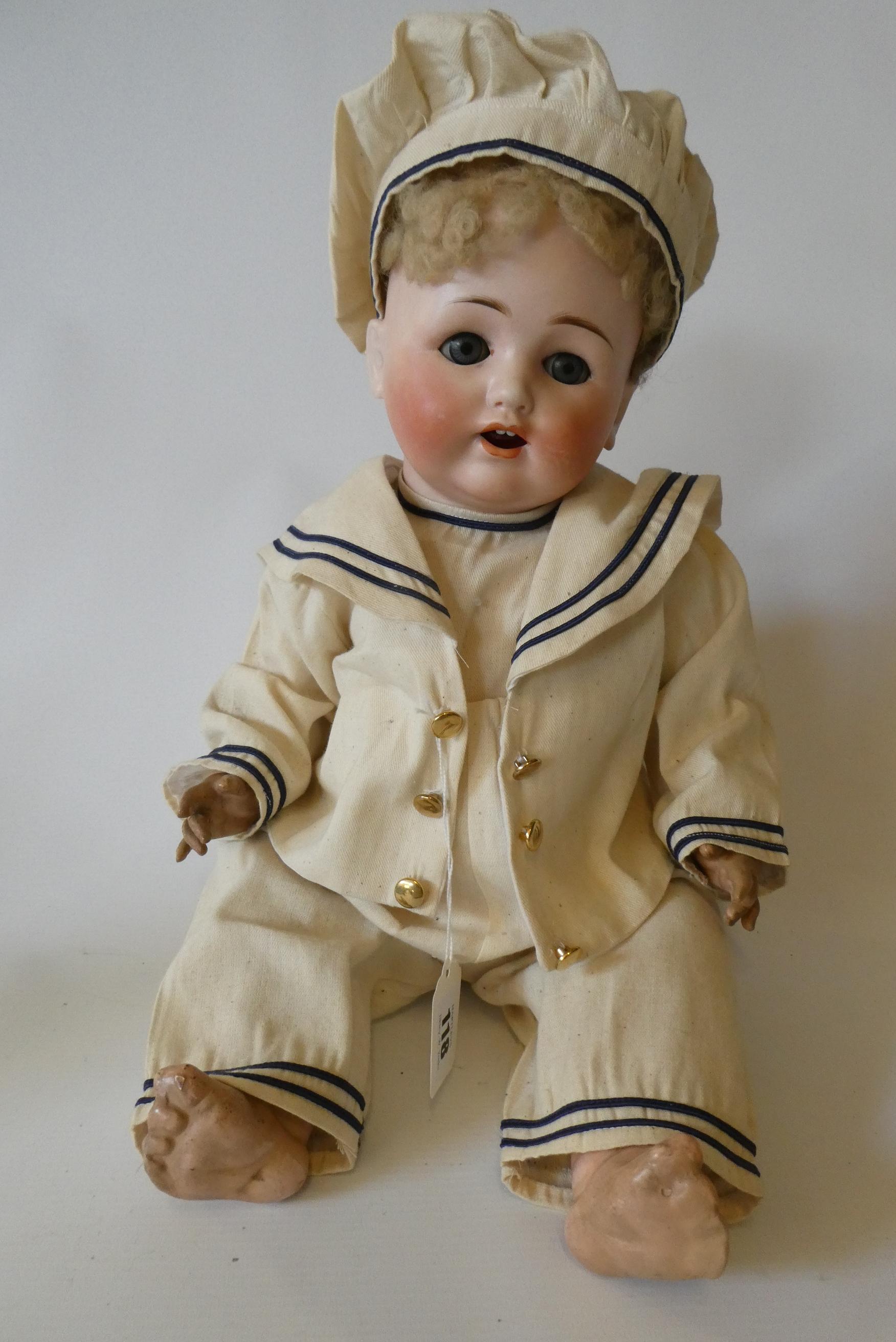 A Max Handwerck Bebe Elite bisque socket head sailor doll with blue glass sleeping eyes Image