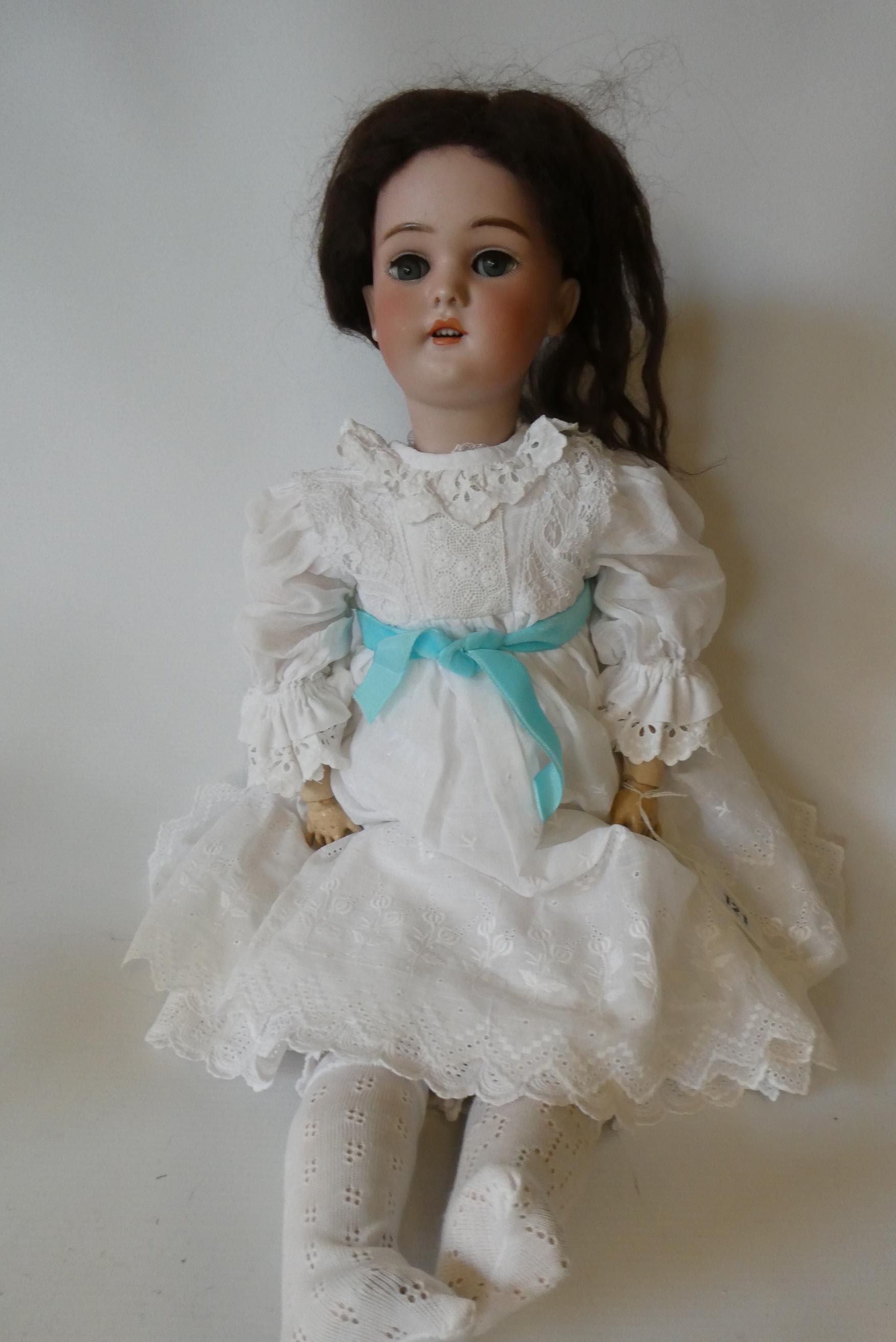 A Simon & Halbig bisque socket head doll Image