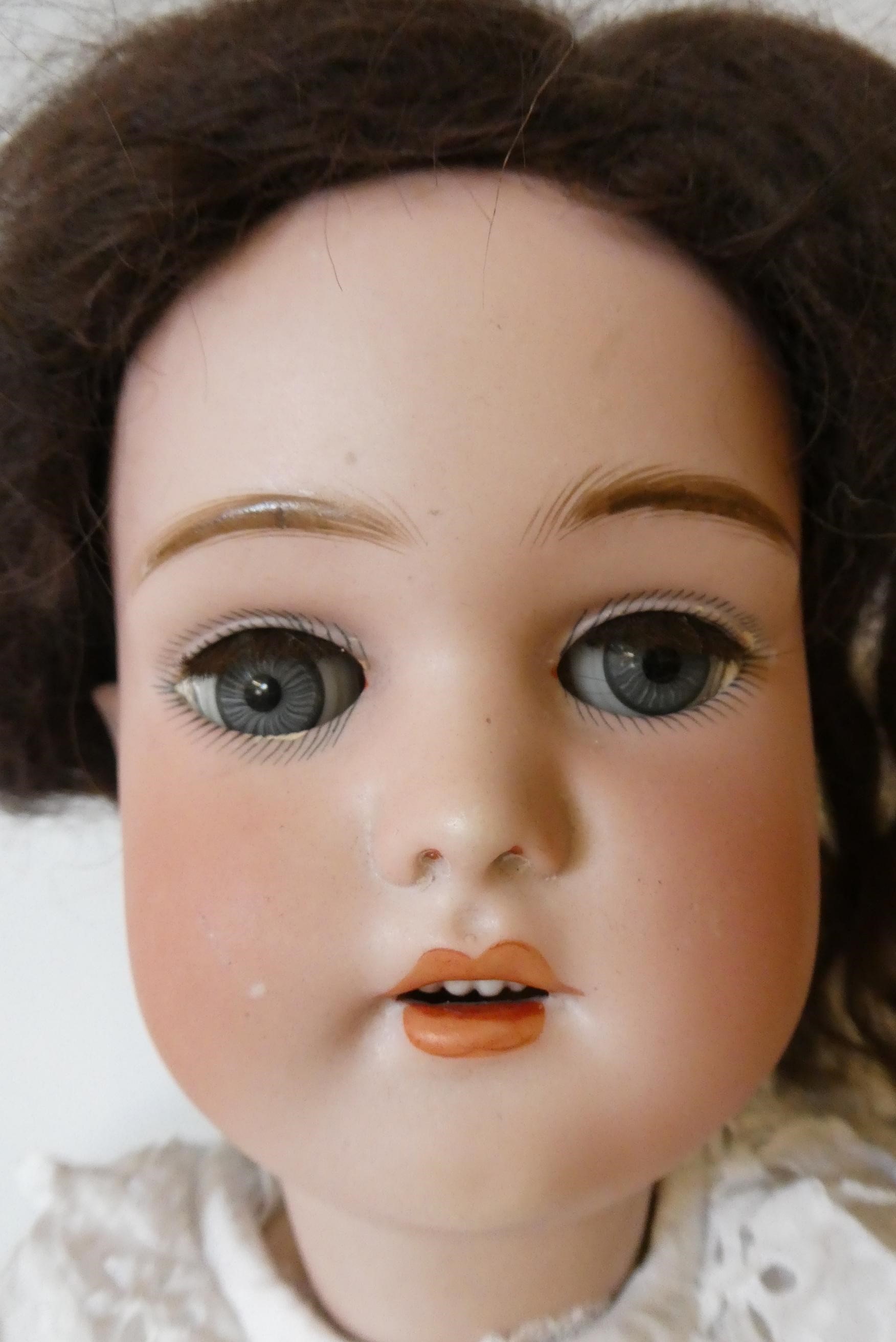 A Simon & Halbig bisque socket head doll Image